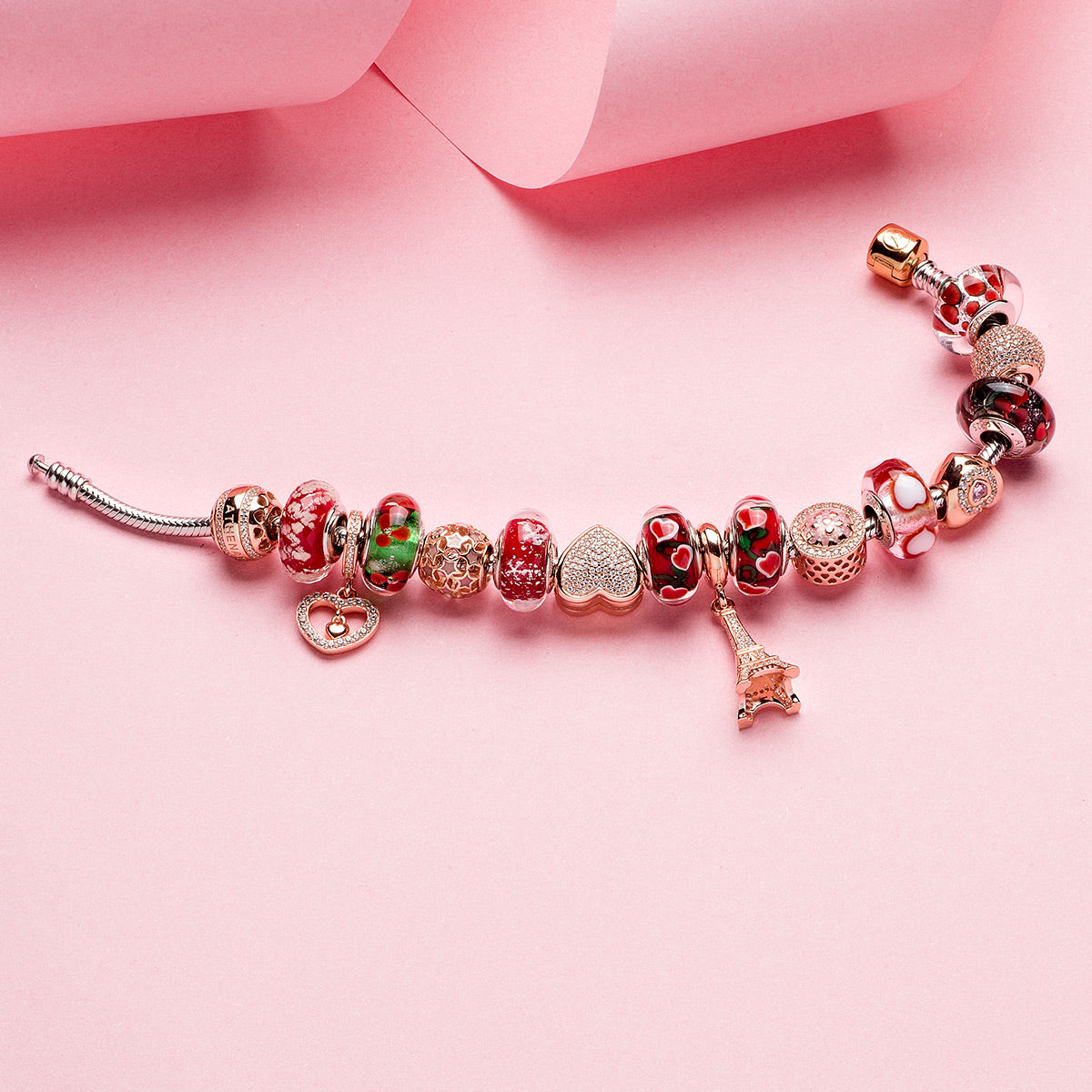 Rosy Heart charm with matching pavé charms on bracelet – elegant jewelry set