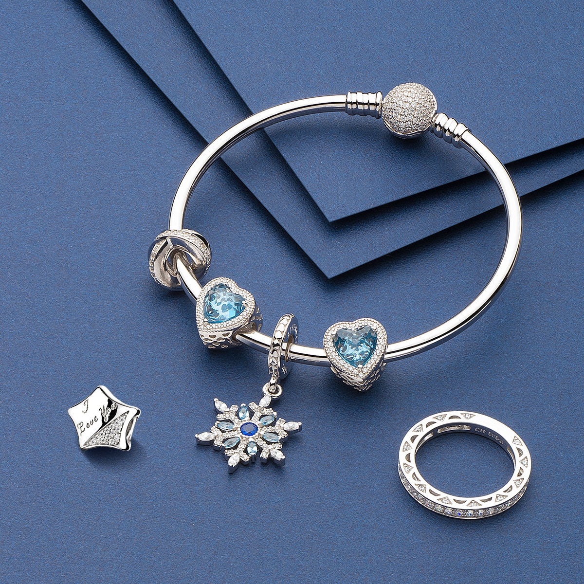 Styled bracelet with ATHENAIE Starlit Love charm bead