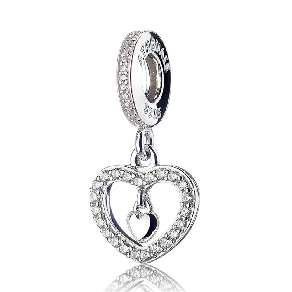 Sparkling heart dangle charm in 925 sterling silver, white background