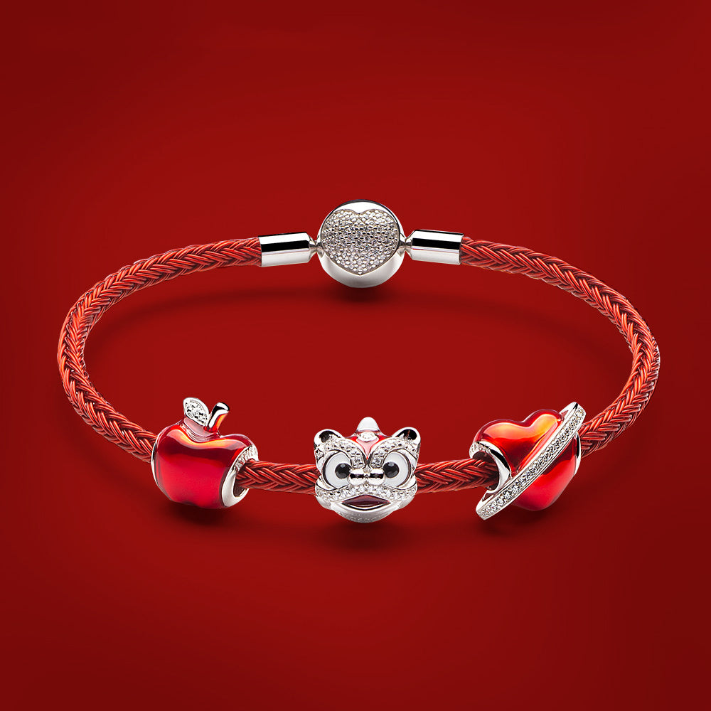 Styled bracelet set featuring red Chinese lion dance charm and matching beads