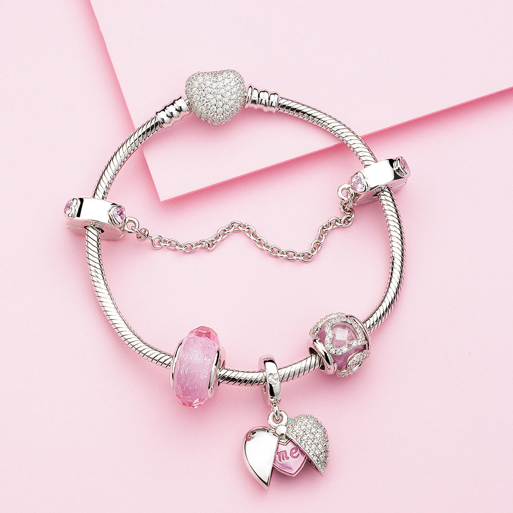Complete charm bracelet styled with pink CZ heart safety chain