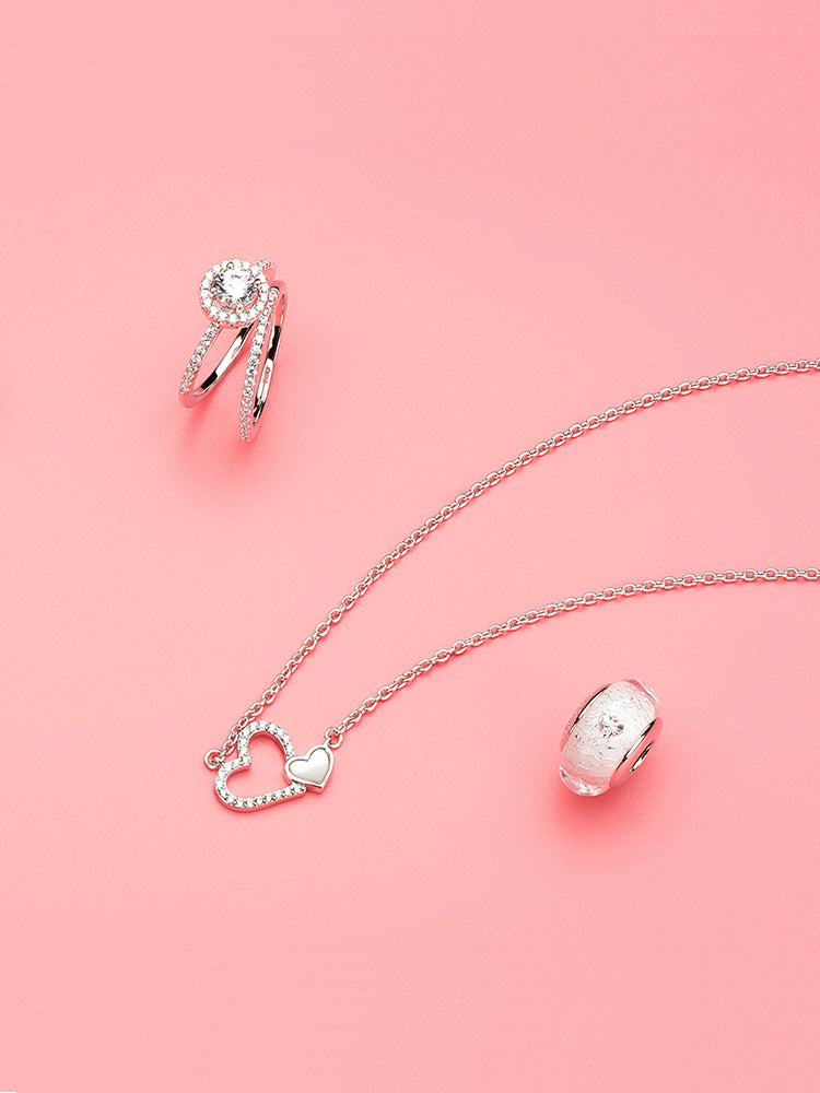 Anillo de compromiso doble con elegancia clásica