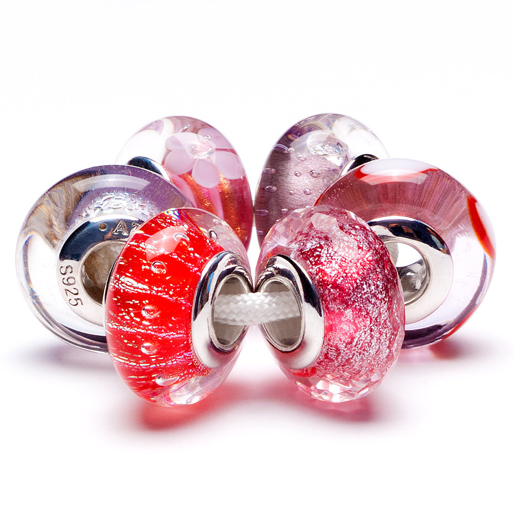Close-up of Blooming Kiss Murano Glass Bead on bracelet