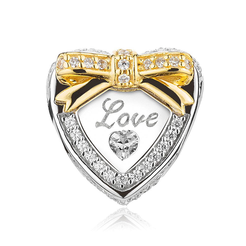 Front view of ATHENAIE gold crown heart charm bead with pink bow