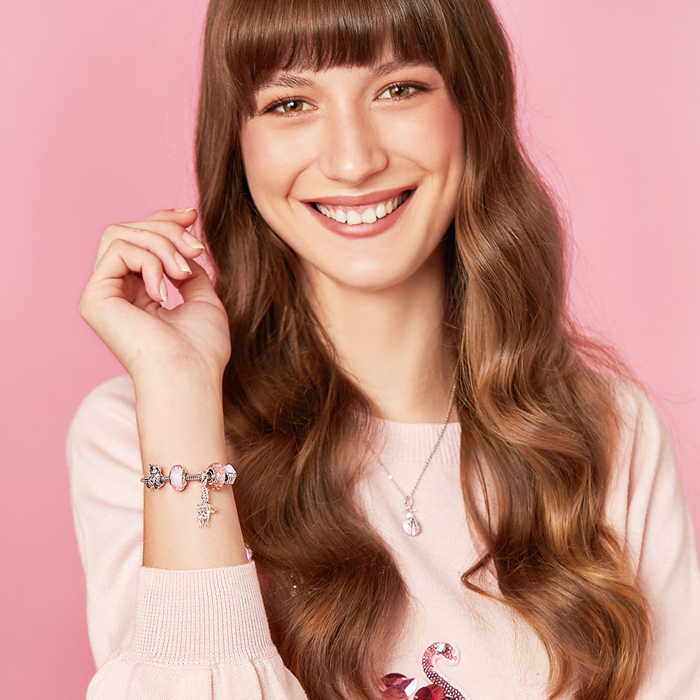 Model wearing ATHENAIE Ballet Embrace Pendant Charm – graceful jewelry look 1