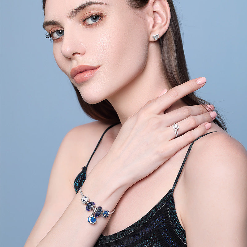 Model wearing Blue Starlight 925 silver charm bead with CZ stones