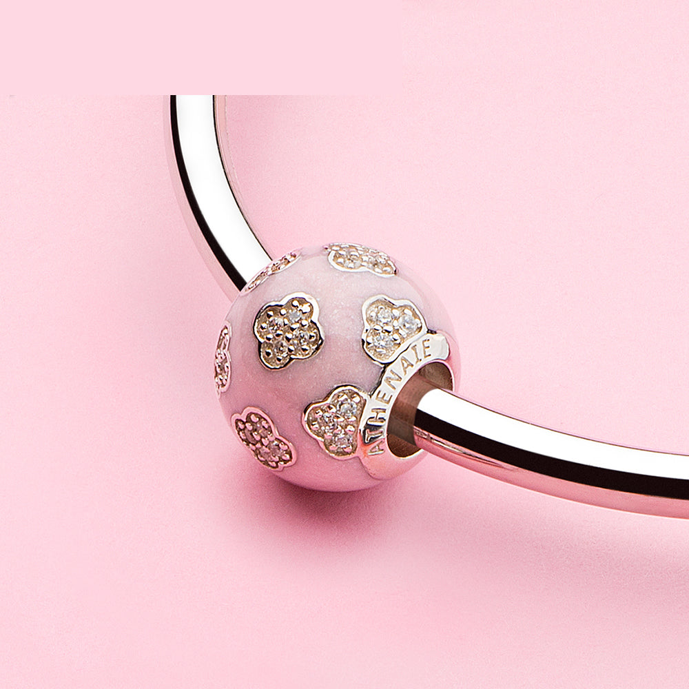 Lifestyle scene with silver four-leaf clover charm bead, perfect lucky gift for women