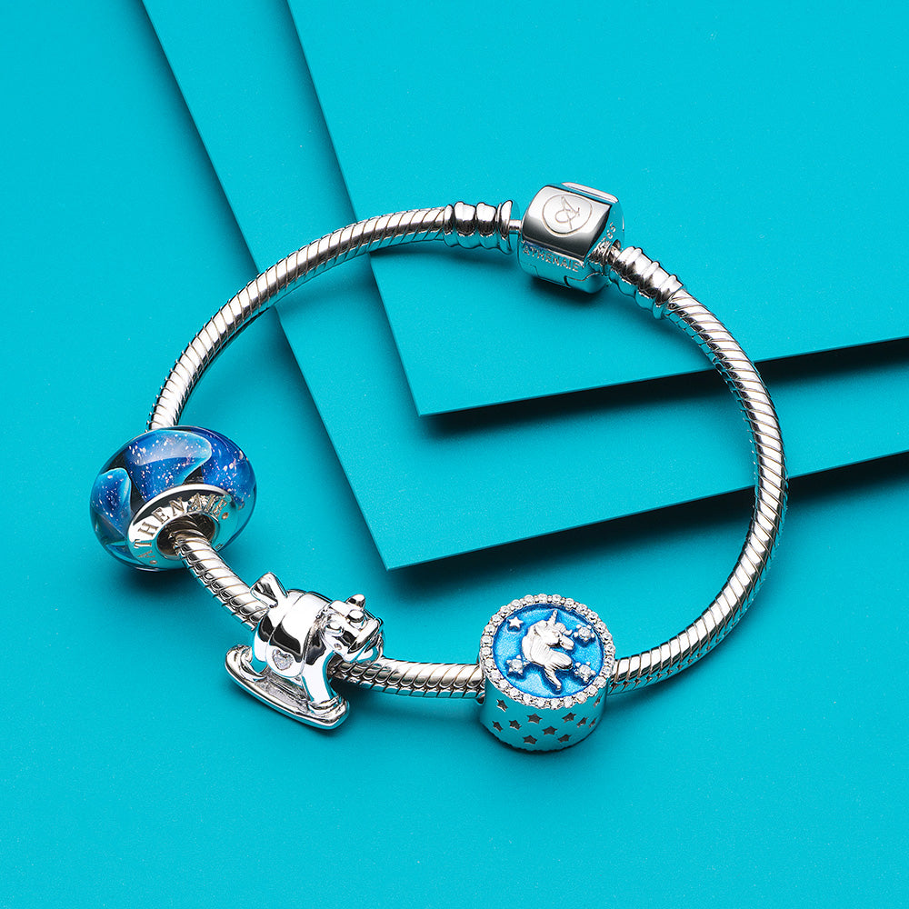 ATHENAIE Stellar Dream charm bead styled with multiple beads on bracelet