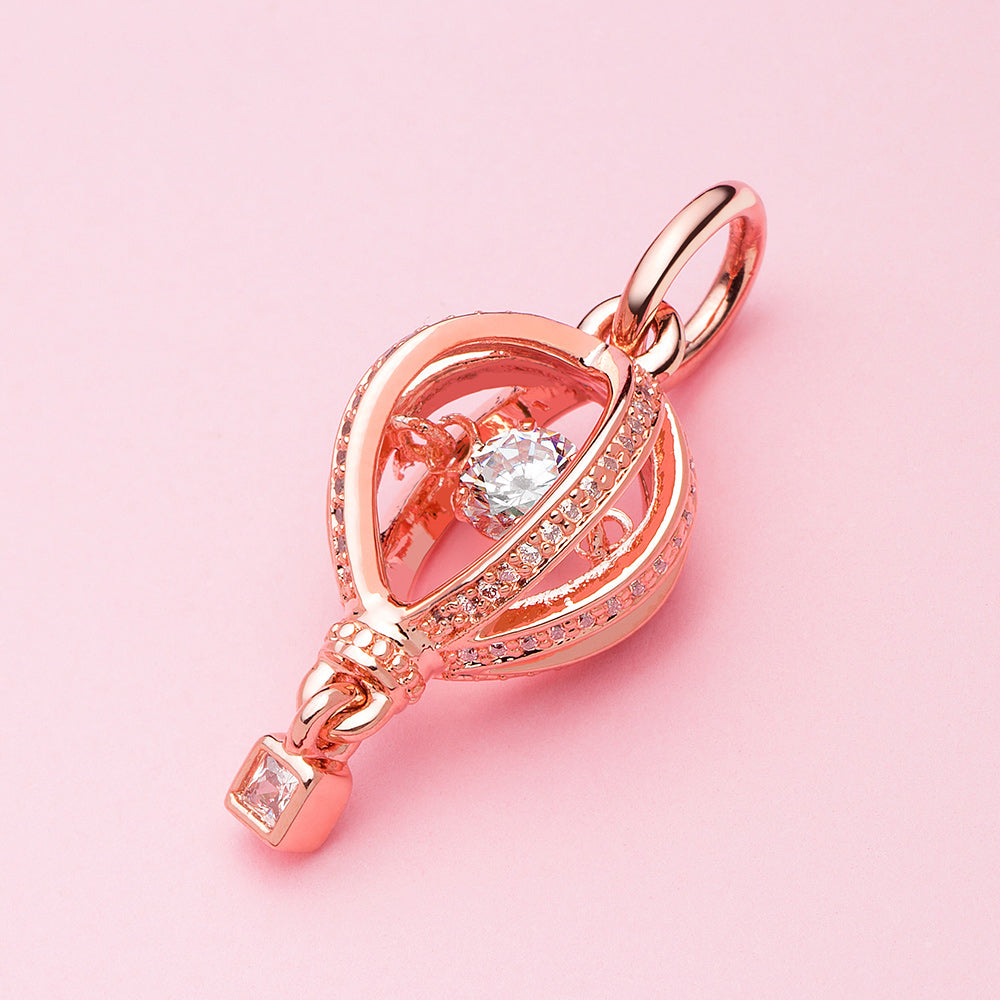 ATHENAIE Shimmer Voyage Travel Pendant Charm – artistic scene display with 3A zirconia