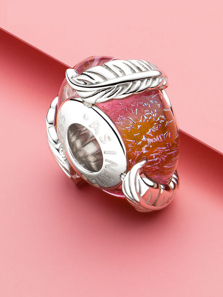 Autumn feather Murano glass charm bead styled on bracelet