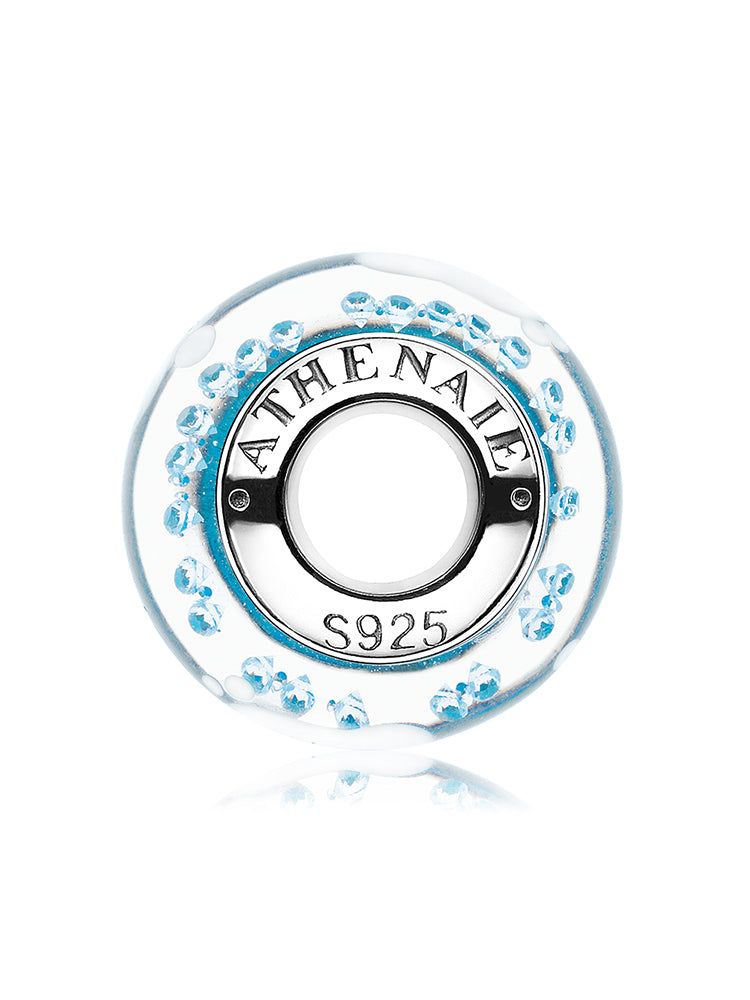 Side view of baby footprint Murano glass bead charm with silver core by ATHENAIE