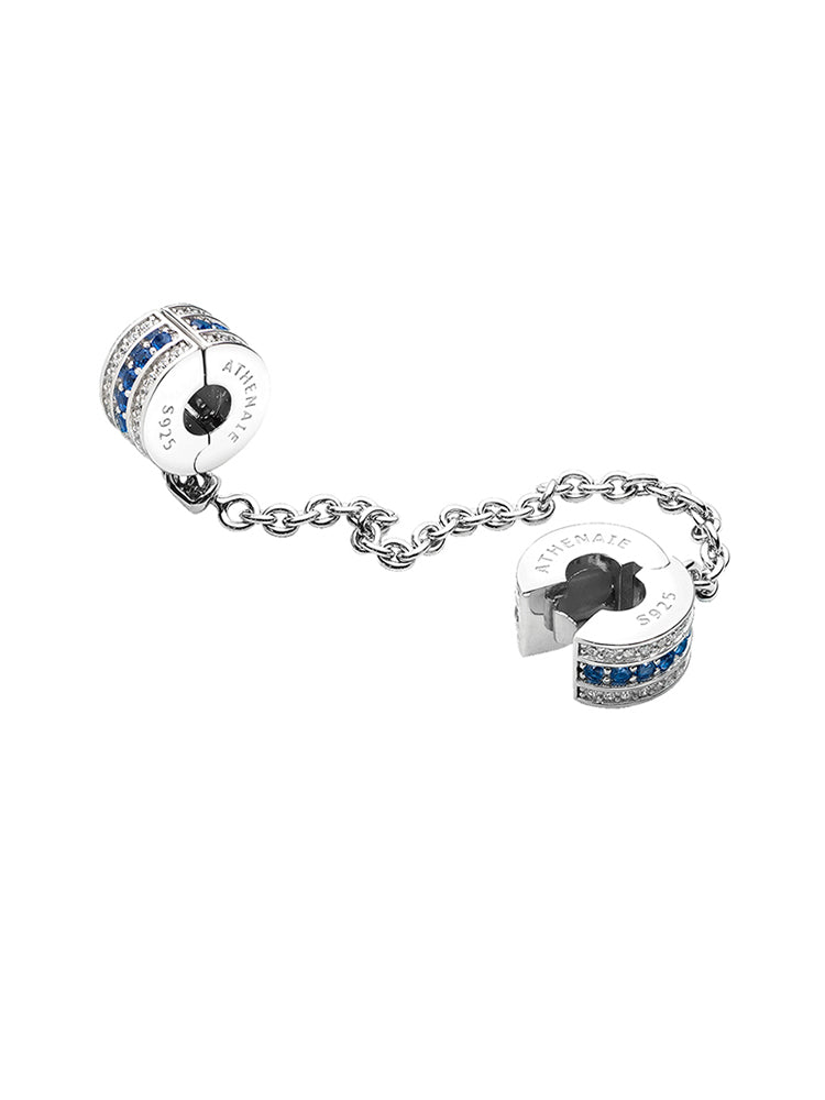 Blue Haven sterling silver safety chain charm with blue stones front view