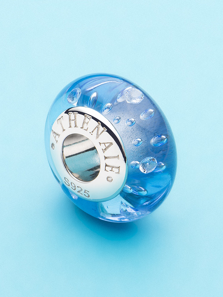 Blue Murano glass charm bead on bracelet