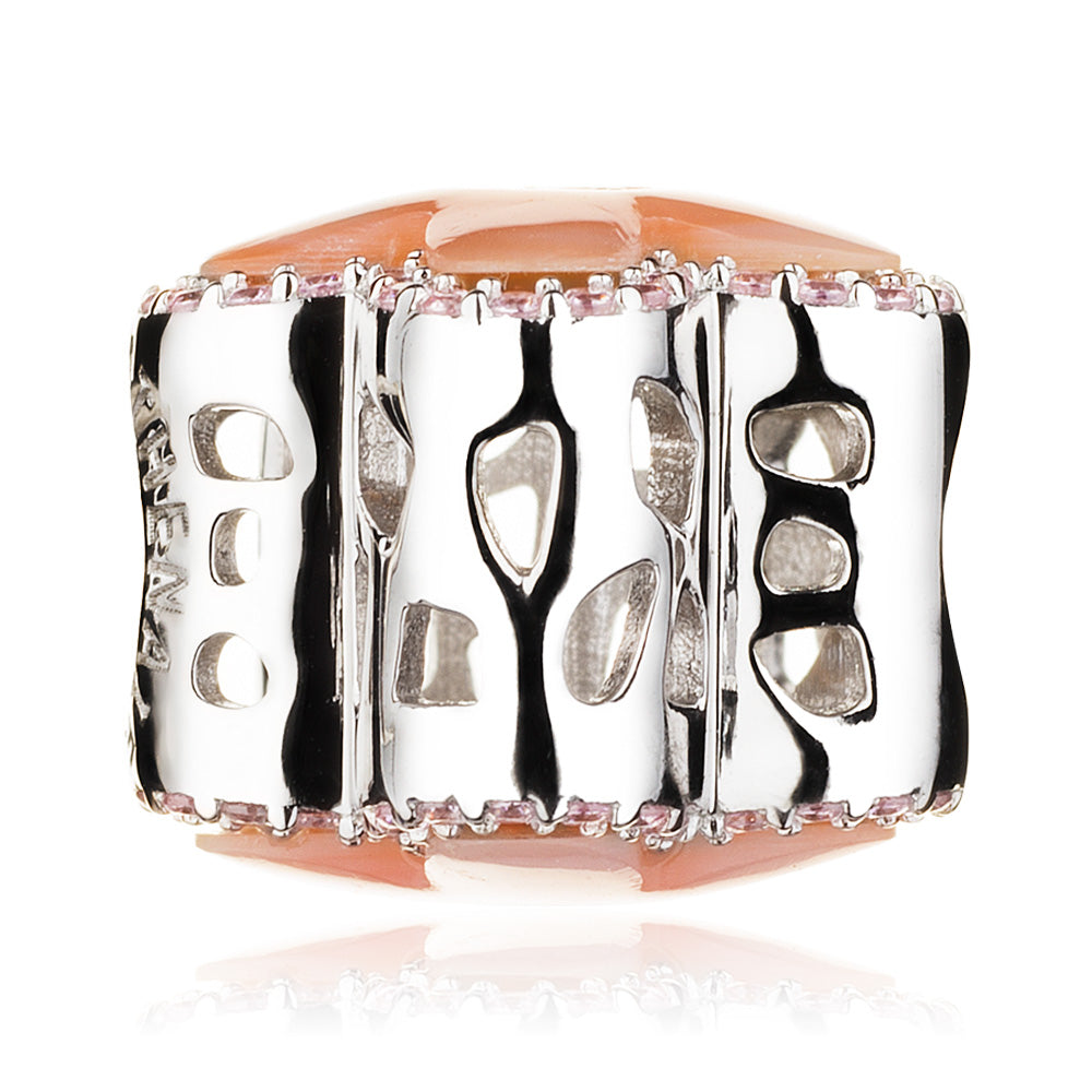 Side view of Blush Blossom charm bead with petal-like contours, CZ sparkle and shell inlay on polished silver surface