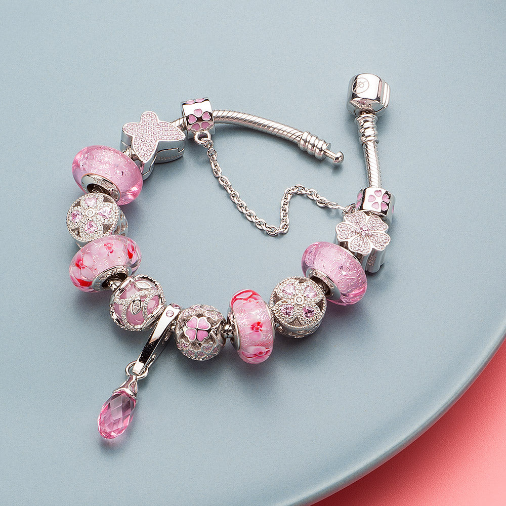Blush Clover charm bead styled with CZ sparkle and sterling silver beads, elegant and timeless bracelet design