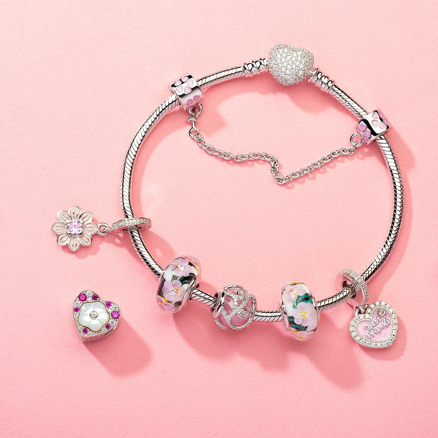 Symbolic charm bracelet featuring Blush Daisy pendant paired with friendship and protection beads, meaningful gift for her