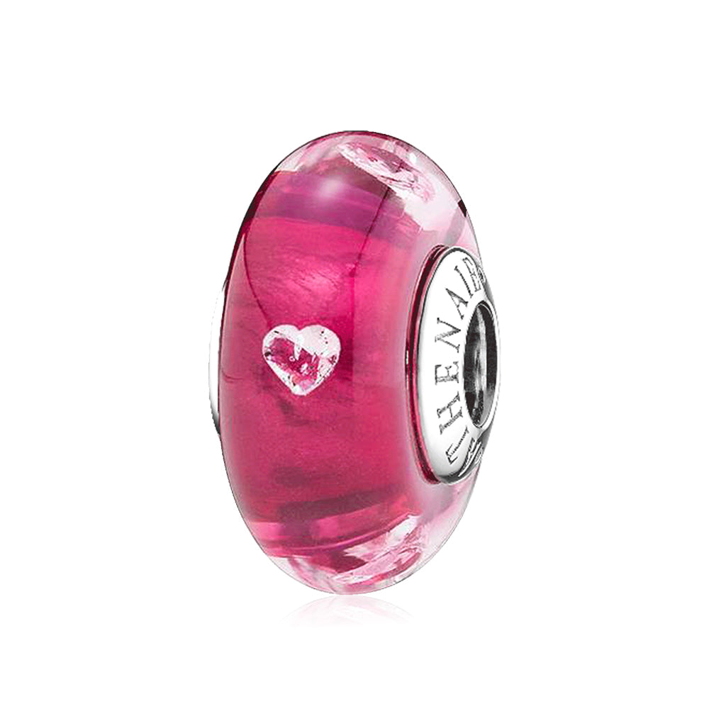 Blush Heart Murano glass charm bead with 925 silver core, front view.