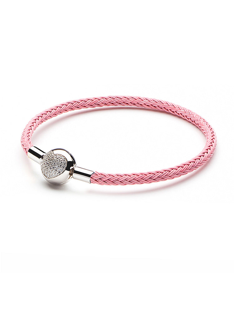 Blush pink braided charm bracelet with sterling silver heart clasp front view