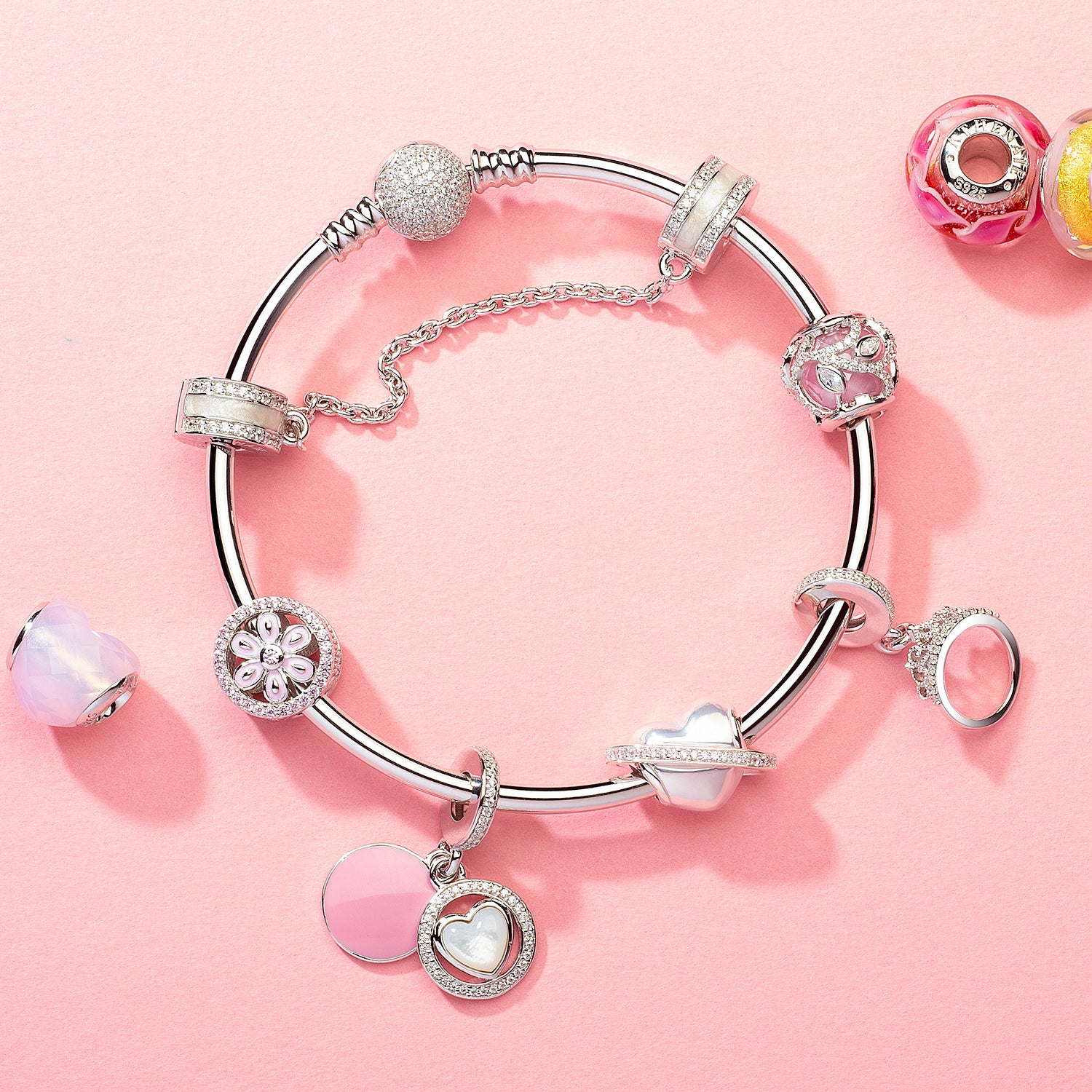 Gift idea: ATHENAIE bracelet with Silent Bond safety chain and pink charms