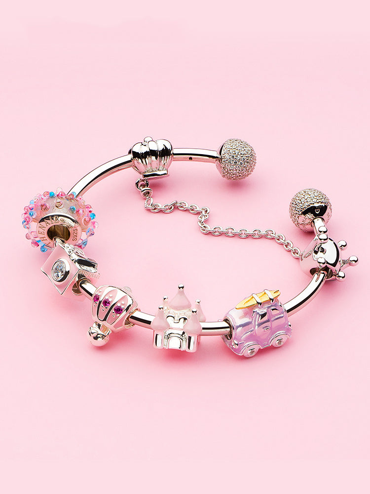 Crown safety chain charm on bracelet styling