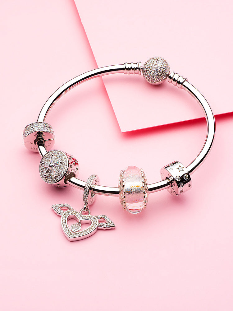 Sterling silver safety clip charm styled on bracelet