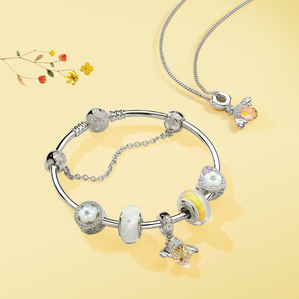 Completed charm bracelet featuring the Crystals Bee Pendant from ATHENAIE