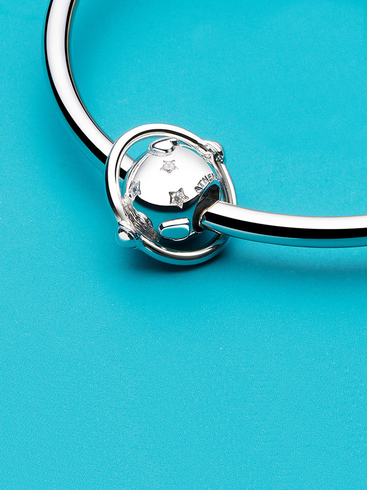 Celestial orbit charm bead styled on charm bracelet by ATHENAIE