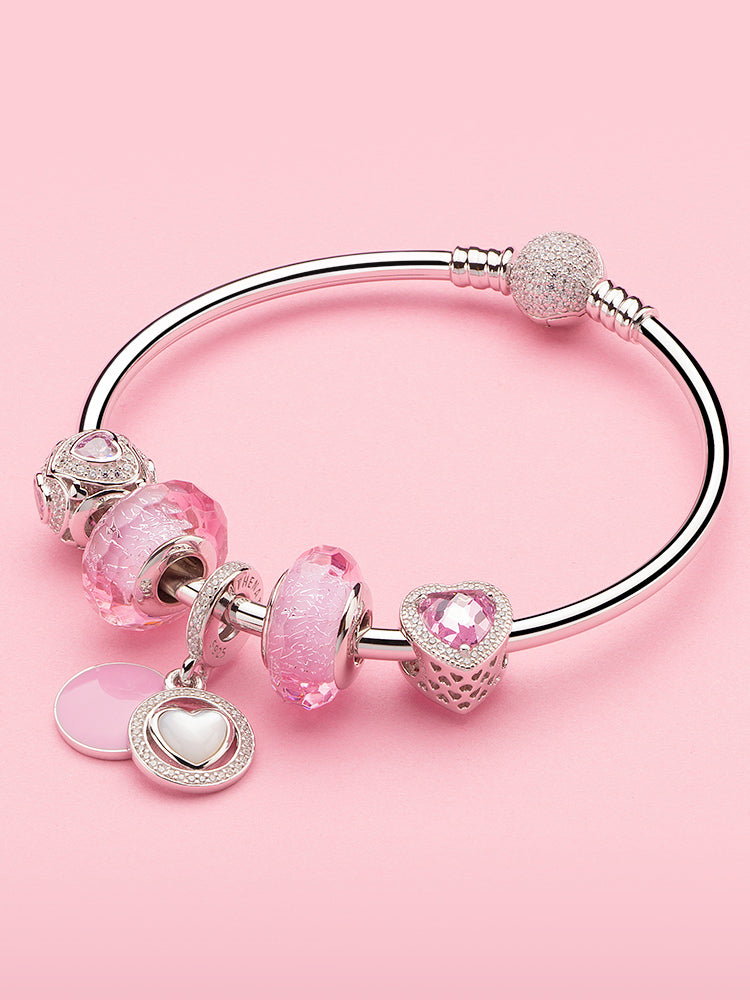 sterling silver charm bangle bracelet styled with charm beads