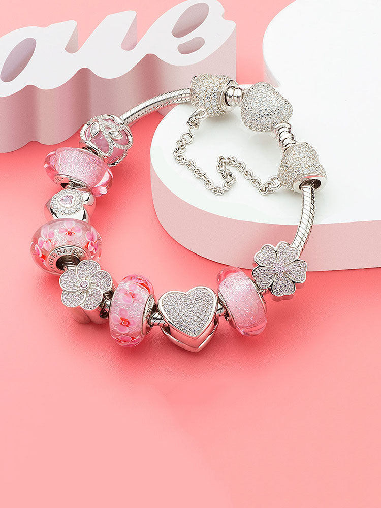 Bracelet styled with blush clover charm bead