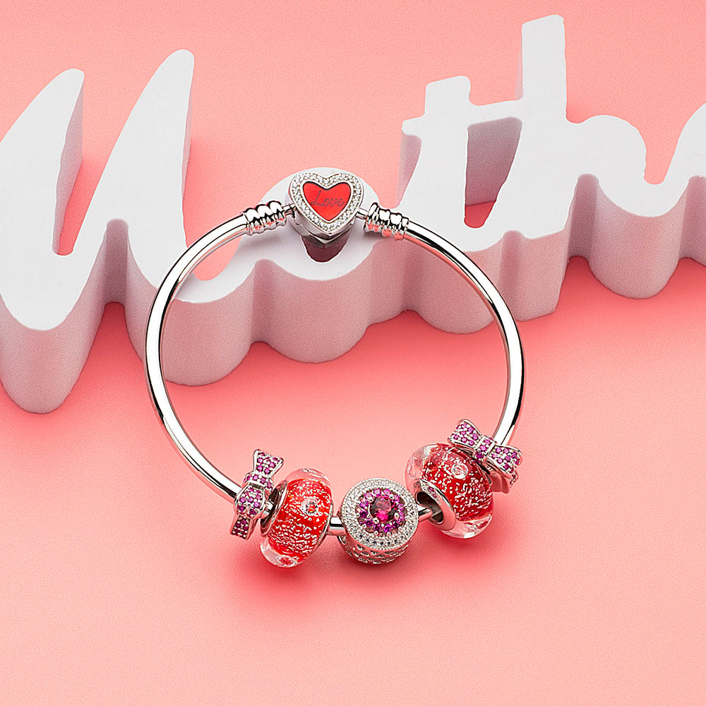 Berry Bow Stopper Charm styled with completed bracelet look
