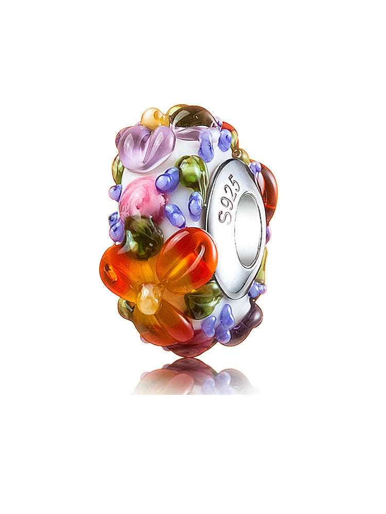 Colorful bohemian floral Murano glass bead with a 925 silver core, front view