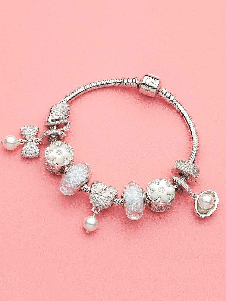 Crystal clip stopper charm styled with snake chain bracelet