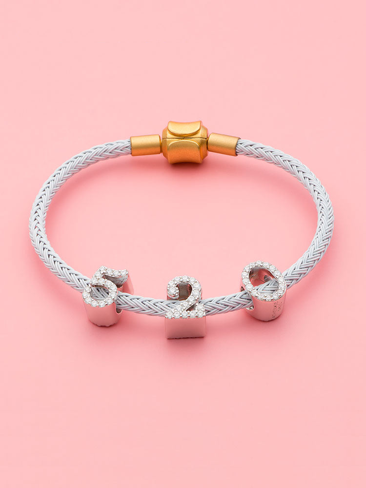 Cubic zirconia number charm bead bracelet detail