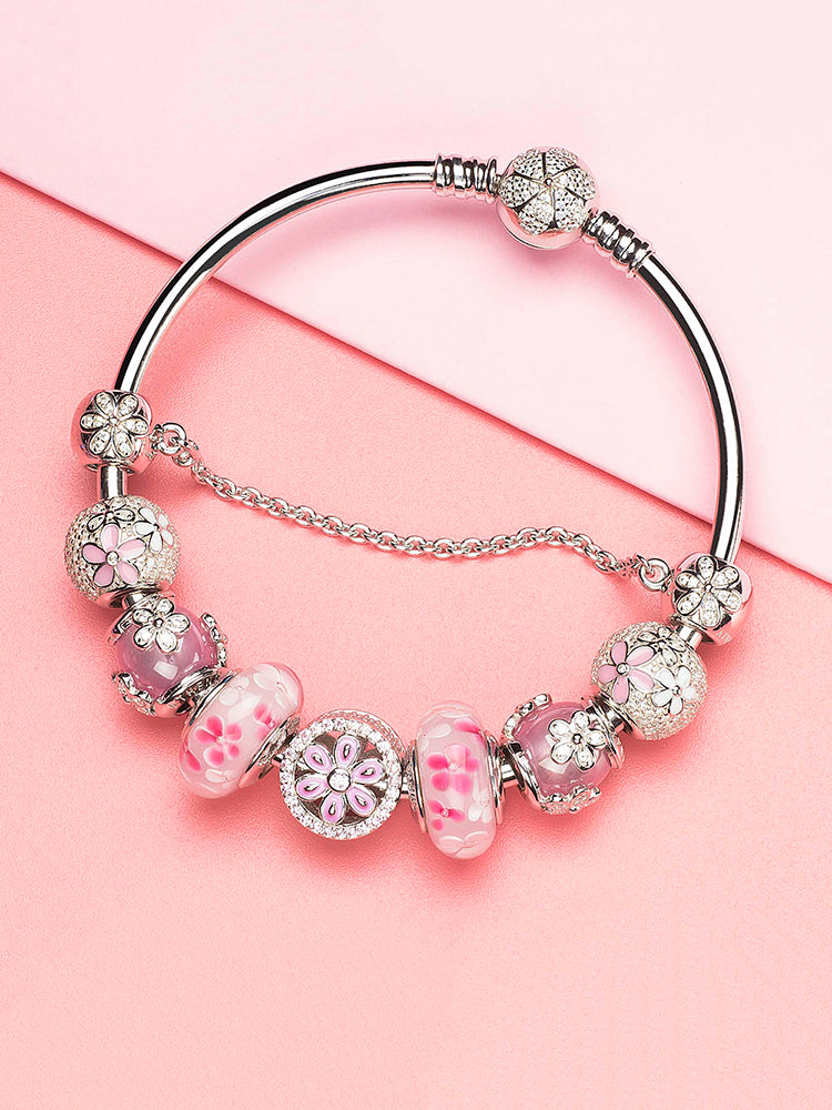 Daisy sterling silver charm bead styled on bracelet by ATHENAIE