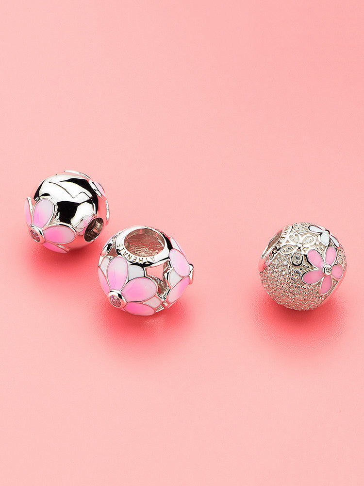 Daisy silver enamel charm styled on European bracelet by ATHENAIE