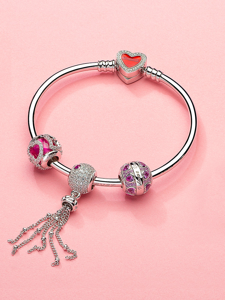 Dancing Heart tassel charm bead styled on sterling silver charm bracelet