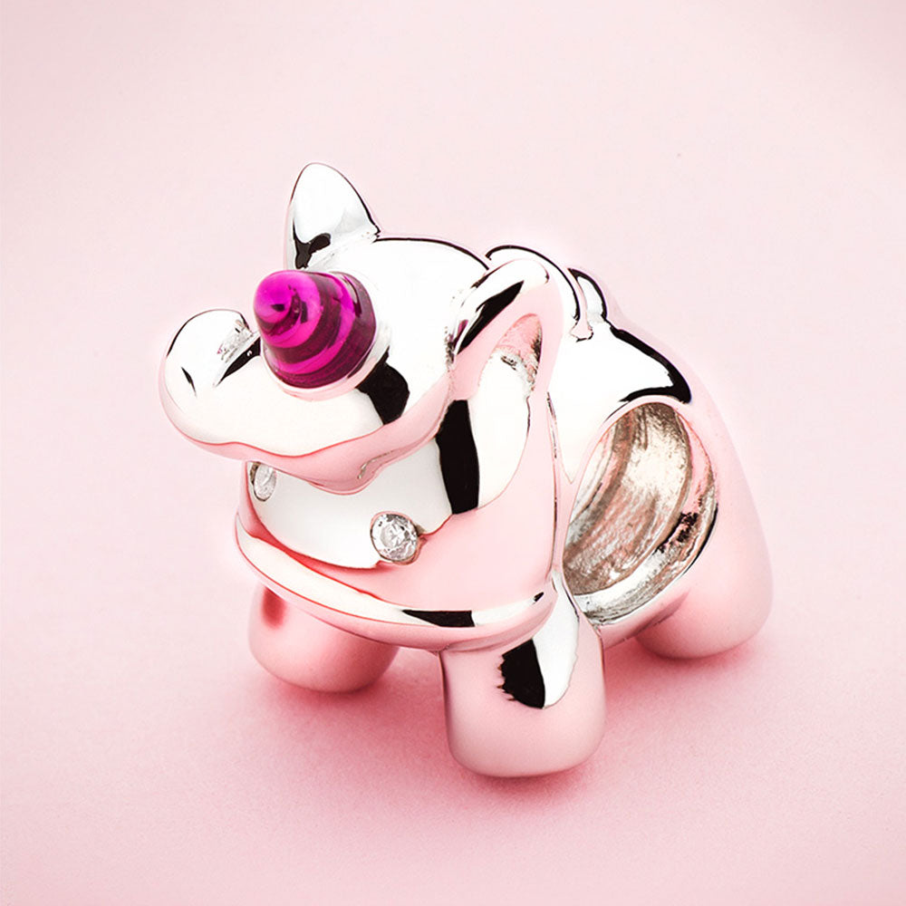 Enamel unicorn charm styled on bracelet – dreamy lifestyle display