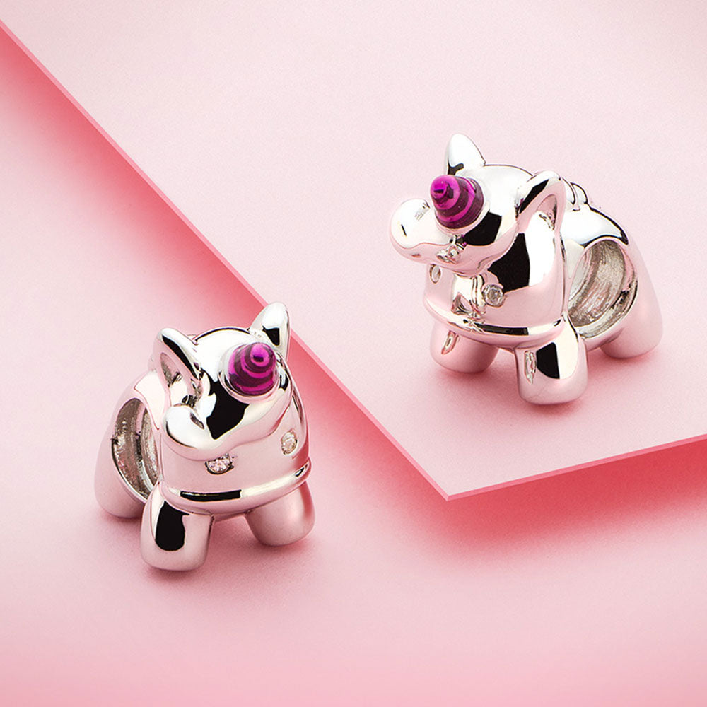 Pisces-inspired unicorn charm scene with bracelet setup