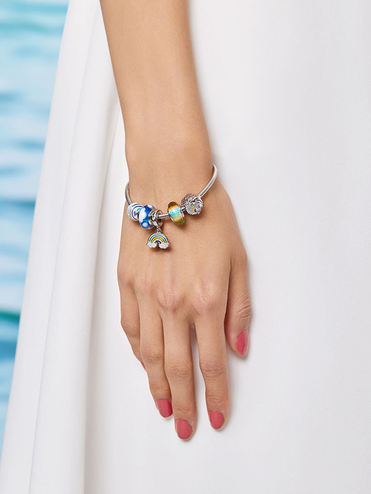 Close view of Dreamy Sky Murano glass charm bead on bracelet