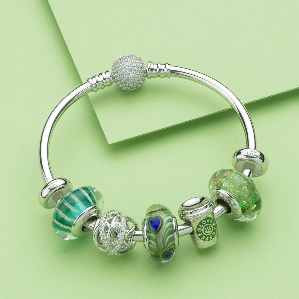 Emerald Breeze Murano glass charm bead styled with European bracelet.