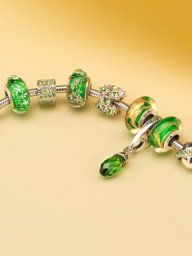 Handcrafted emerald Murano glass charm bead on charm bracelet