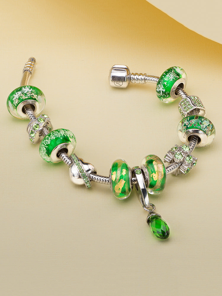 Emerald gold Murano glass charm bead styled on European charm bracelet