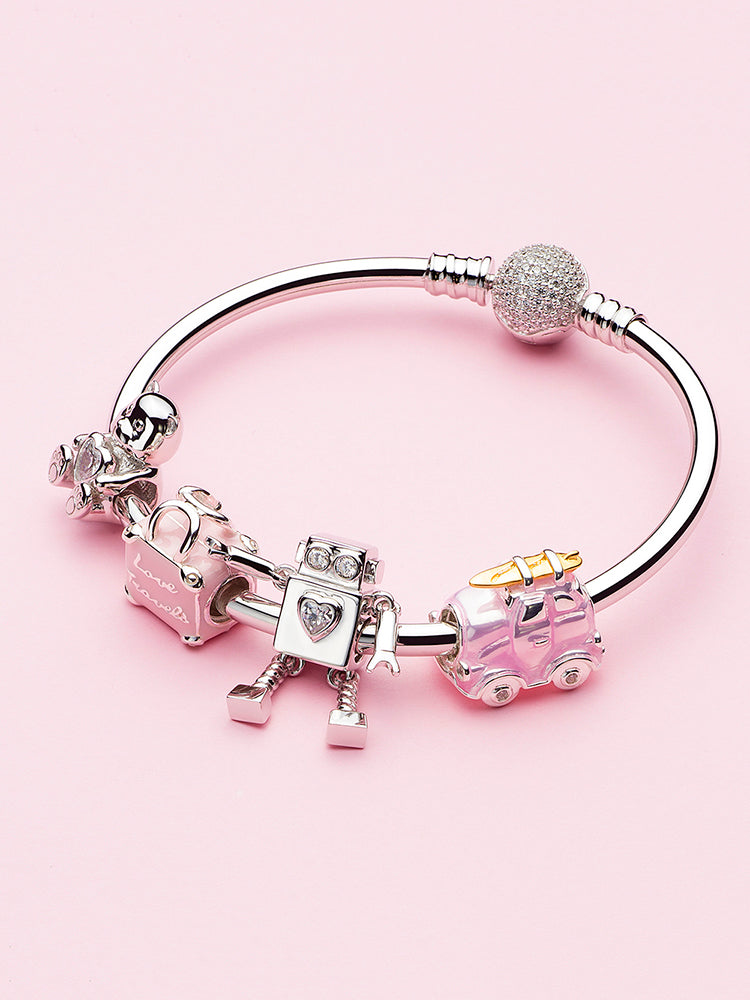 Pink car charm bead paired with silver bracelet styling
