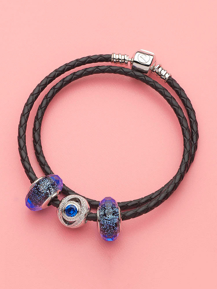 Evil eye charm bead styled with bracelet charms by ATHENAIE