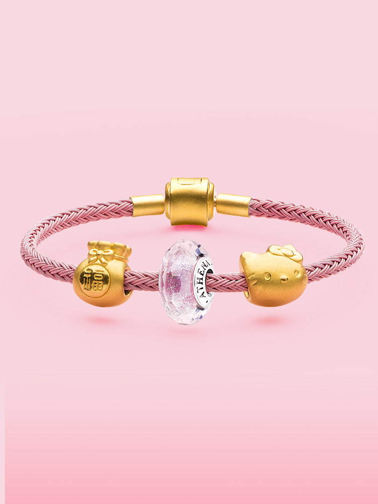 Faceted Murano glass bead in lavender mist paired with silver bracelet charms by ATHENAIE