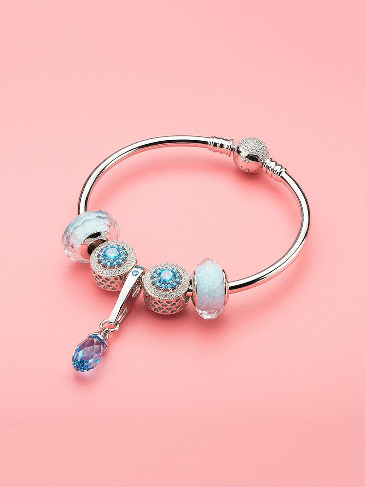 Ocean whisper faceted Murano glass bead styled on European charm bracelet by ATHENAIE