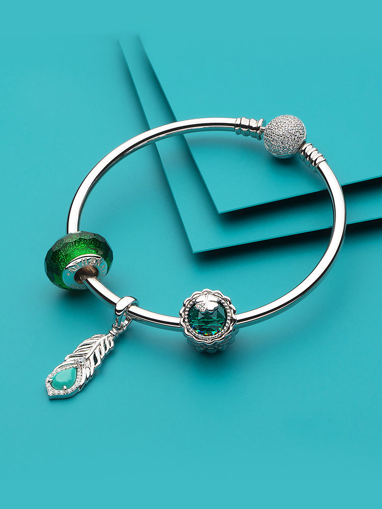 Sterling silver turquoise feather pendant charm on charm bracelet