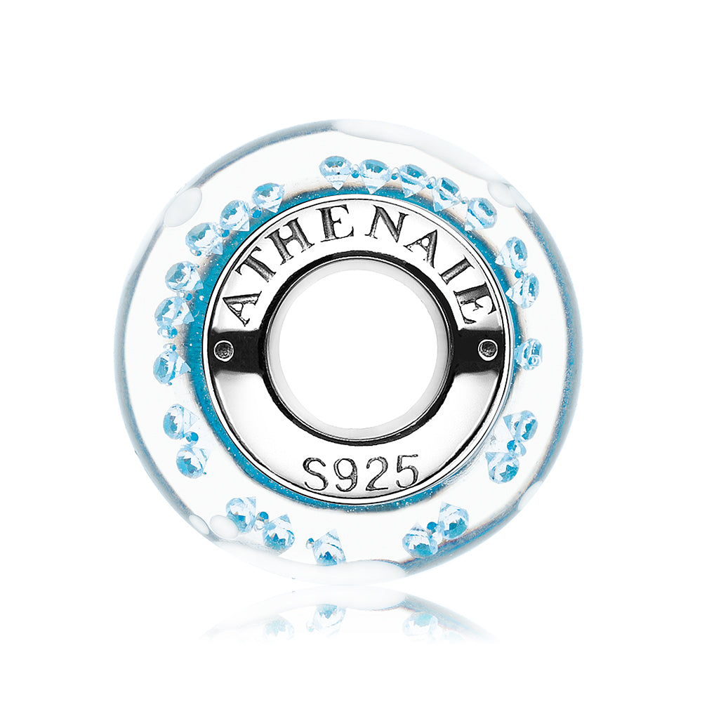 Side view of First Step Murano glass charm with 925 silver core and baby footprint detail
