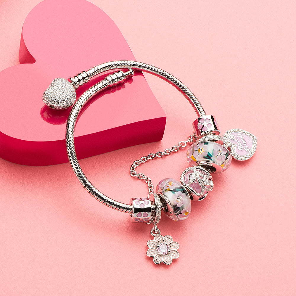 Neutral-toned charm bracelet styled with Forever Friends pendant, perfect for everyday wear and emotional connection