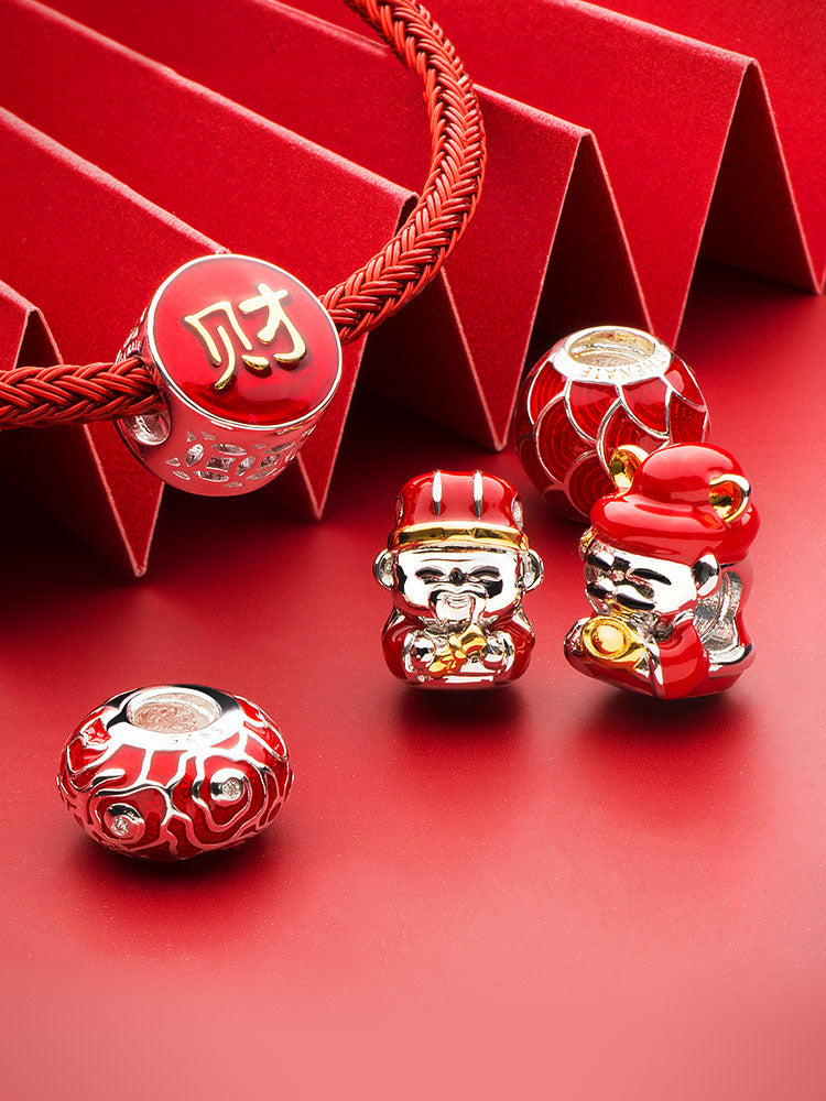 Fortune god charm bead detail symbolic prosperity design